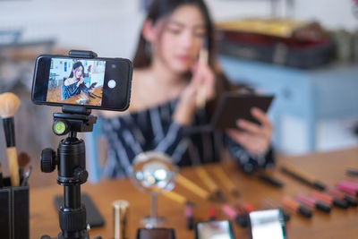 Young woman using mobile phone