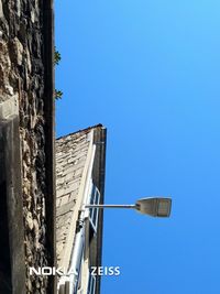 Low angle view of building against blue sky