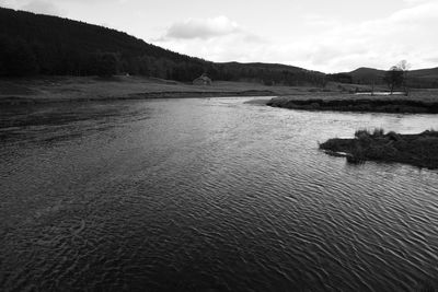 Scenic view of river against sky