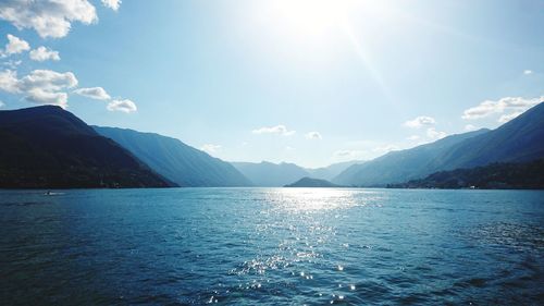 Scenic view of sea against sky on sunny day