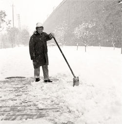 Full length of man standing on snow