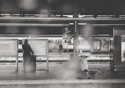 People at railroad station