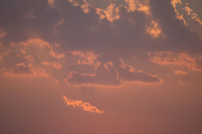 Low angle view of clouds in sky during sunset