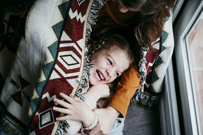 High angle view of smiling girl and woman