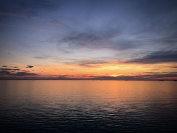 Scenic view of sea at sunset