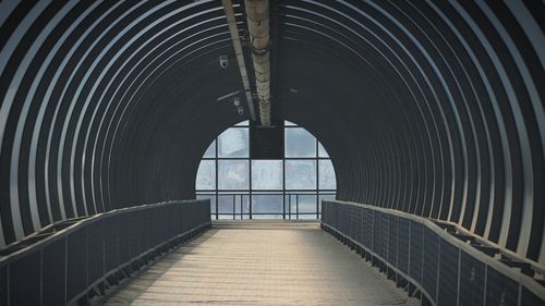 Empty footbridge in tunnel