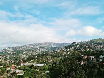 Aerial view of townscape against sky