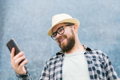 Young man using mobile phone