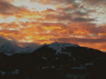 Scenic view of mountains against sky during sunset