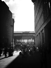 People in front of building
