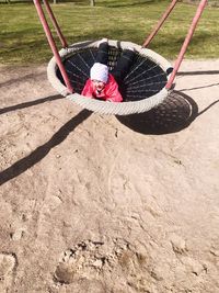 High angle view of girl playing on playground