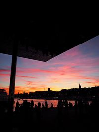 Silhouette people at sunset