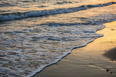 High angle view of sea shore during sunset