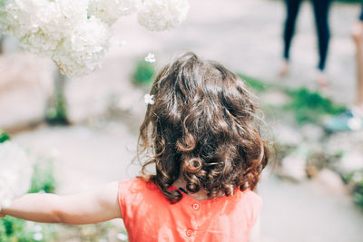 Close-up of girl standing outdoors