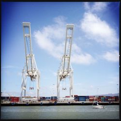 Boats moored at harbor