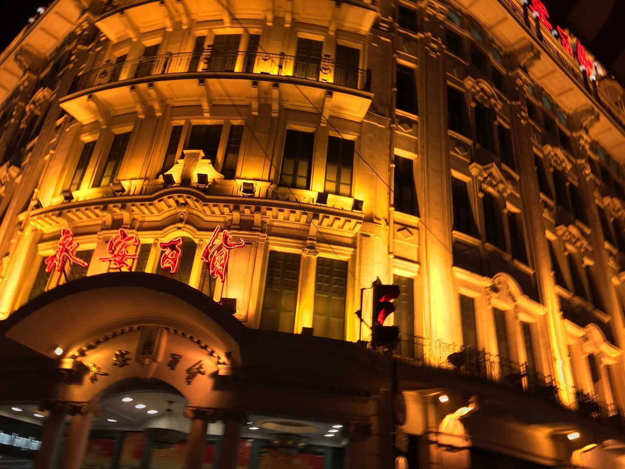 ILLUMINATED BUILDING IN CITY