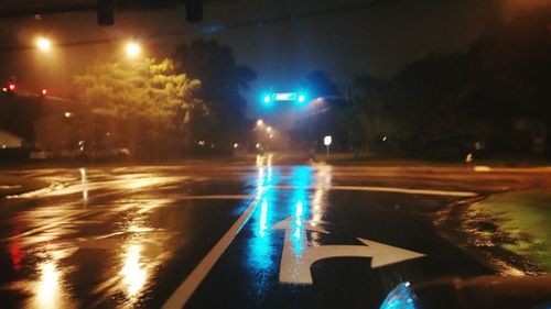 Illuminated street light at night