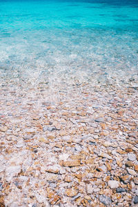 High angle view of stones on beach