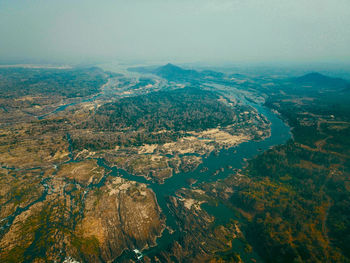 Aerial droneshot of mekong river via border of two countries which is between cambodia and laos.