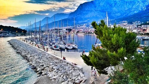 Boats moored in sea