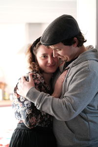 Portrait of smiling young couple