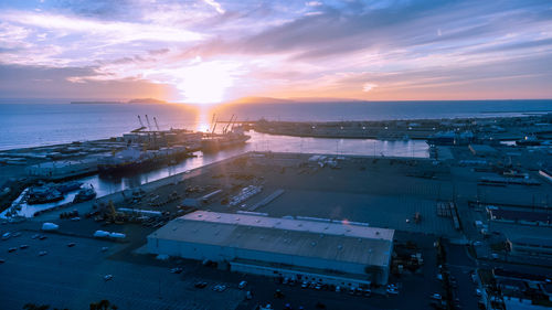 High angle view of city at sunset