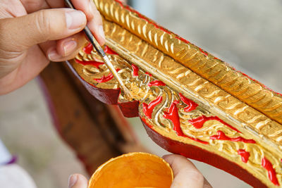 Close-up of hand holding food