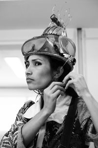 Actress representing a character on the stage of a theater. 