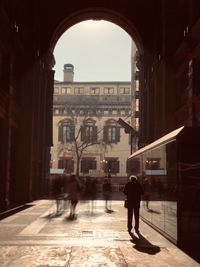 People walking on street in city