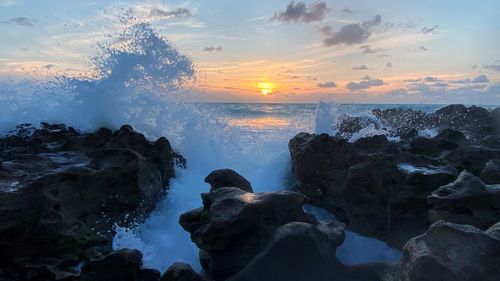 Scenic view of sea against sky during sunset