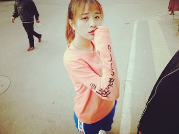 Boy standing on road