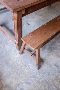 High angle view of abandoned chair on table