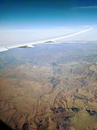 Aerial view of dramatic landscape against sky