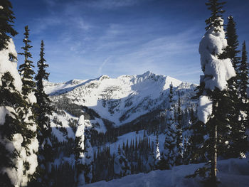 Snow covered mountain against sky