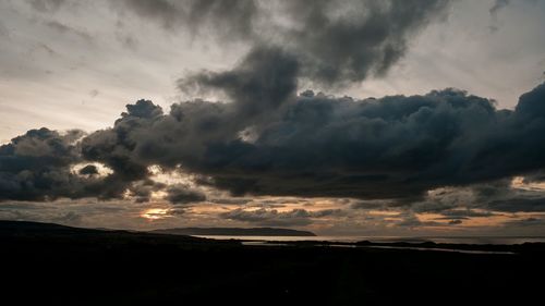 Scenic view of dramatic sky during sunset