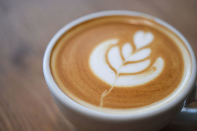 High angle view of cappuccino on table