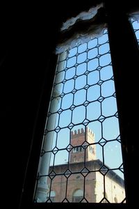 Low angle view of glass window in building