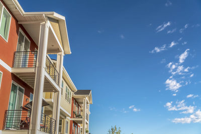 Low angle view of building against blue sky