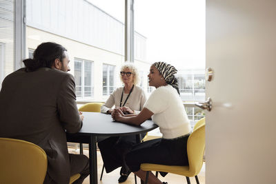 People talking during business meeting