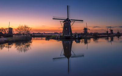 Scenic and charming little place to have sneak peek into dutch architecture with windmills.