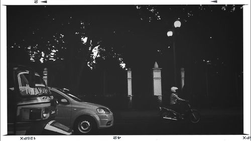 Cars on road at night