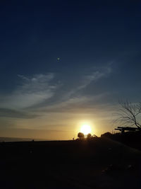 Scenic view of silhouette landscape against sky during sunset