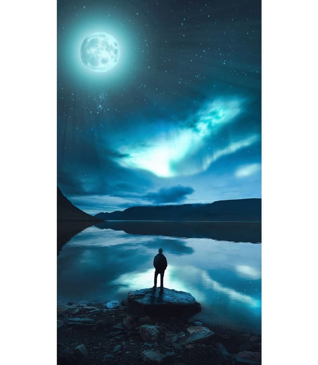 auto post production filter, sky, transfer print, water, one person, standing, leisure activity, nature, real people, cloud - sky, silhouette, rear view, beauty in nature, lifestyles, blue, unrecognizable person, night, scenics - nature, astronomy, outdoors, digital composite