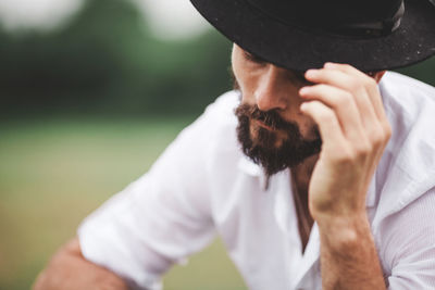 Handsome young man wearing hat