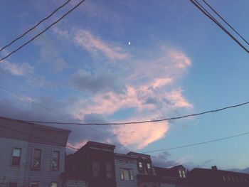 Low angle view of houses against sky