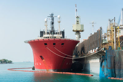 View of ship in sea against clear sky