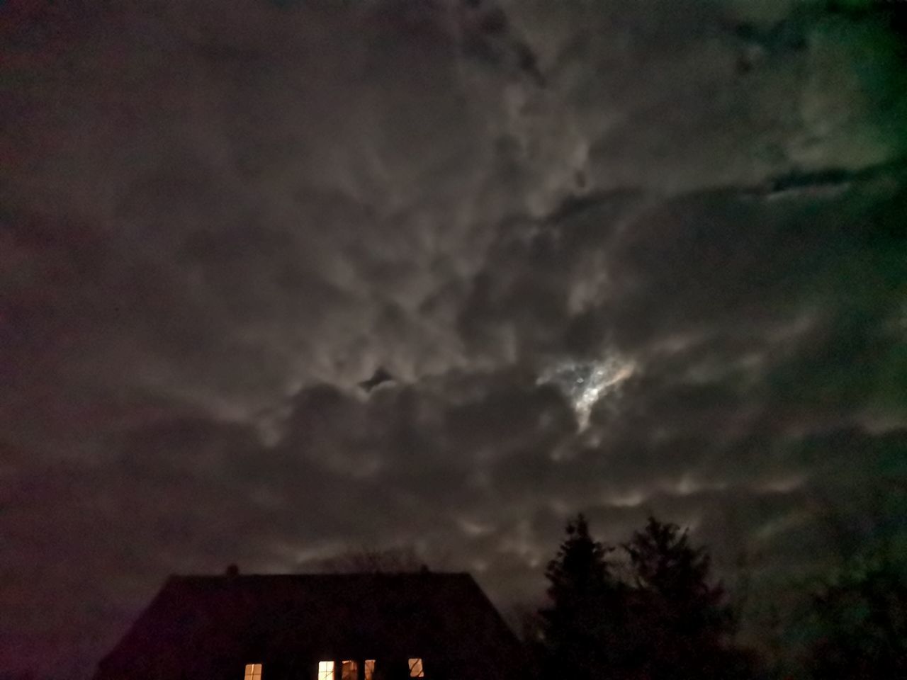 LOW ANGLE VIEW OF CLOUDY SKY OVER SILHOUETTE BUILDING