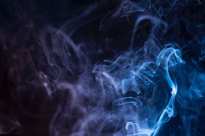 Close-up of smoke against black background