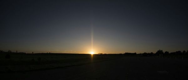 Scenic view of landscape at sunset