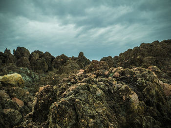 Scenic view of rocks against sky